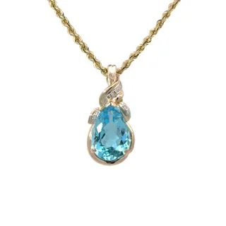 handmade gold nugget ring Pear Shape Blue Topaz Enhancer with diamonds