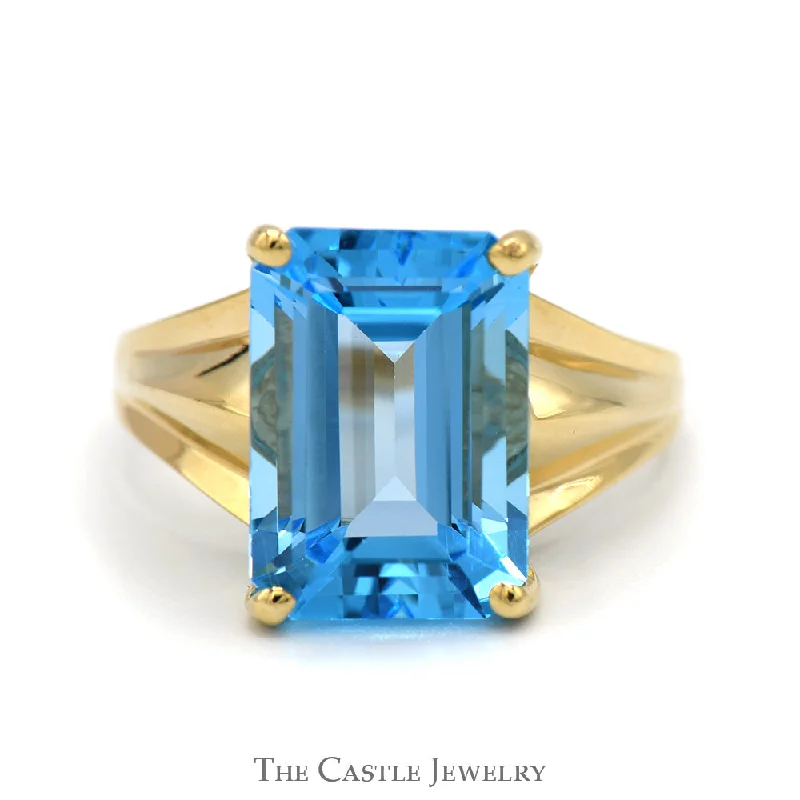 Emerald Cut Blue Topaz Ring with Polished Tapered Sides in 10k Yellow Gold