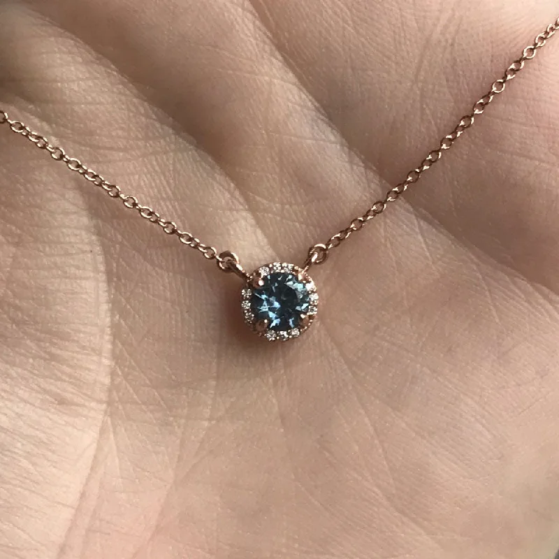 handcrafted braided silver bracelet 0.52ct Montana Sapphire and diamond halo necklace in 14k rose gold handcrafted braided silver bracelet 0.52ct Montana Sapphire and diamond halo necklace in 14k rose gold