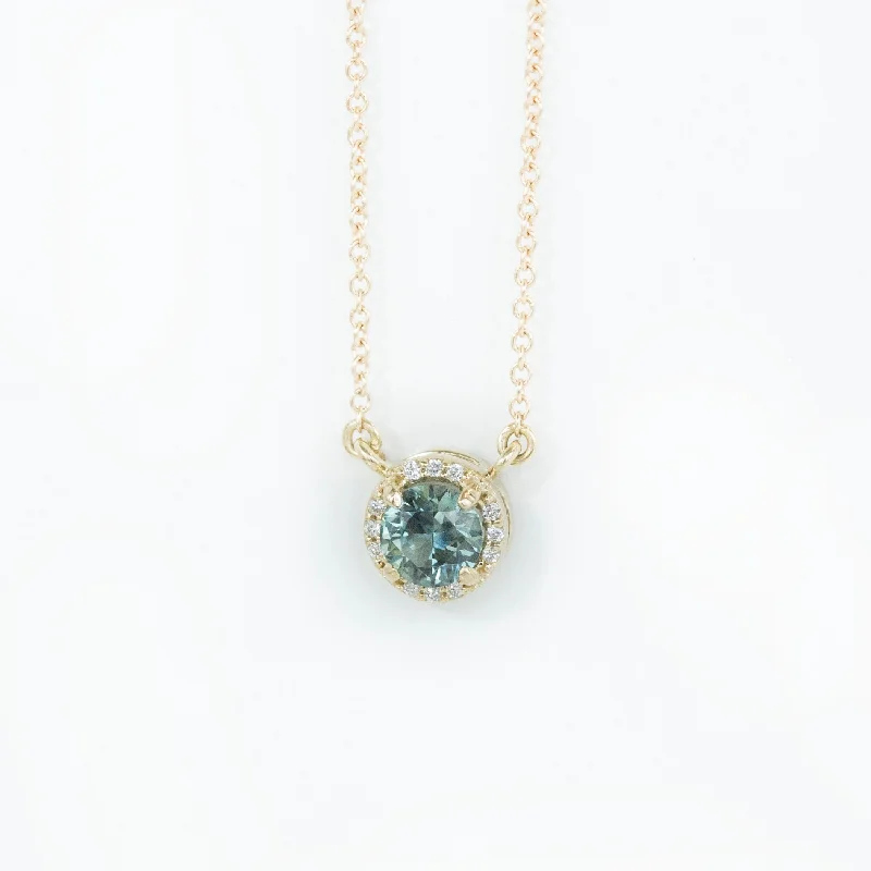 luxury diamond eternity ring 0.56ct Montana Sapphire and diamond halo necklace in 14k yellow luxury diamond eternity ring 0.56ct Montana Sapphire and diamond halo necklace in 14k yellow